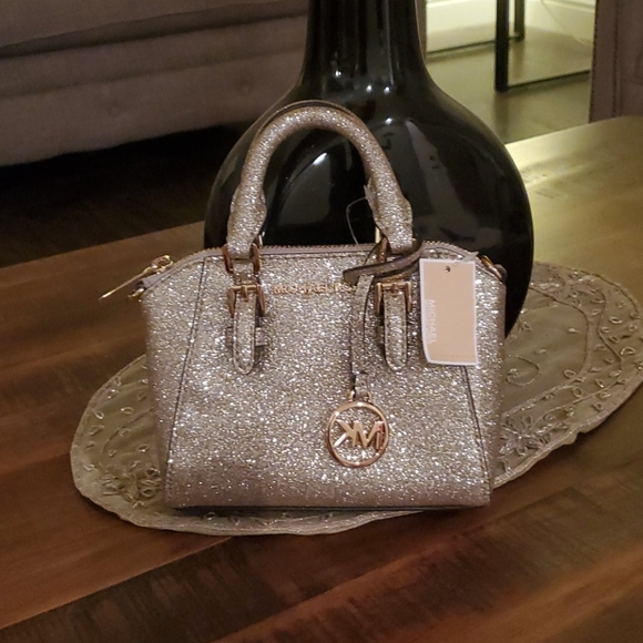 Michael Kors Handbags - Michael Kors Giftable mini gold bag
